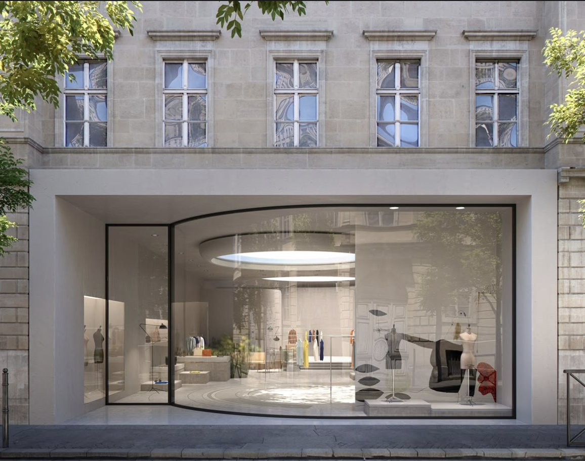 Curved modern storefront glazing with minimalist retail interior